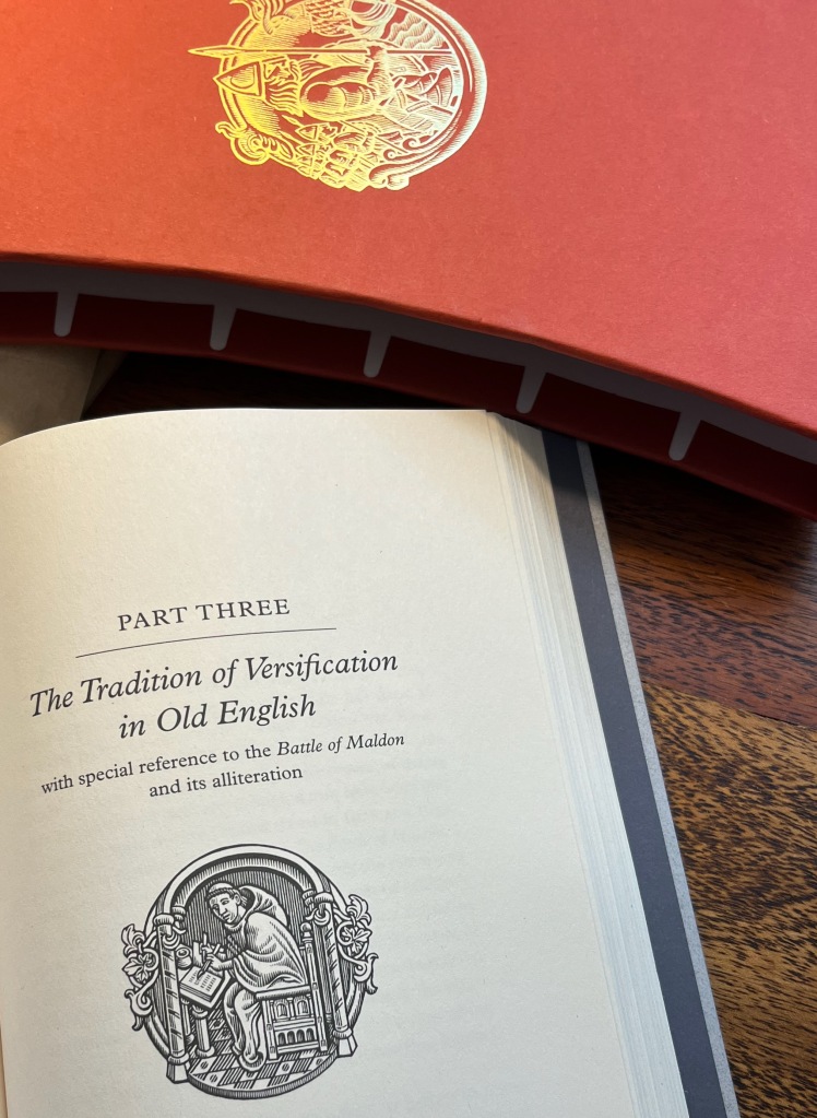 PIcture of a page from the Grybauskas edition showing Part Three, The Tradition of Versification in Old English, alongside the slipcase for the deluxe edition.
